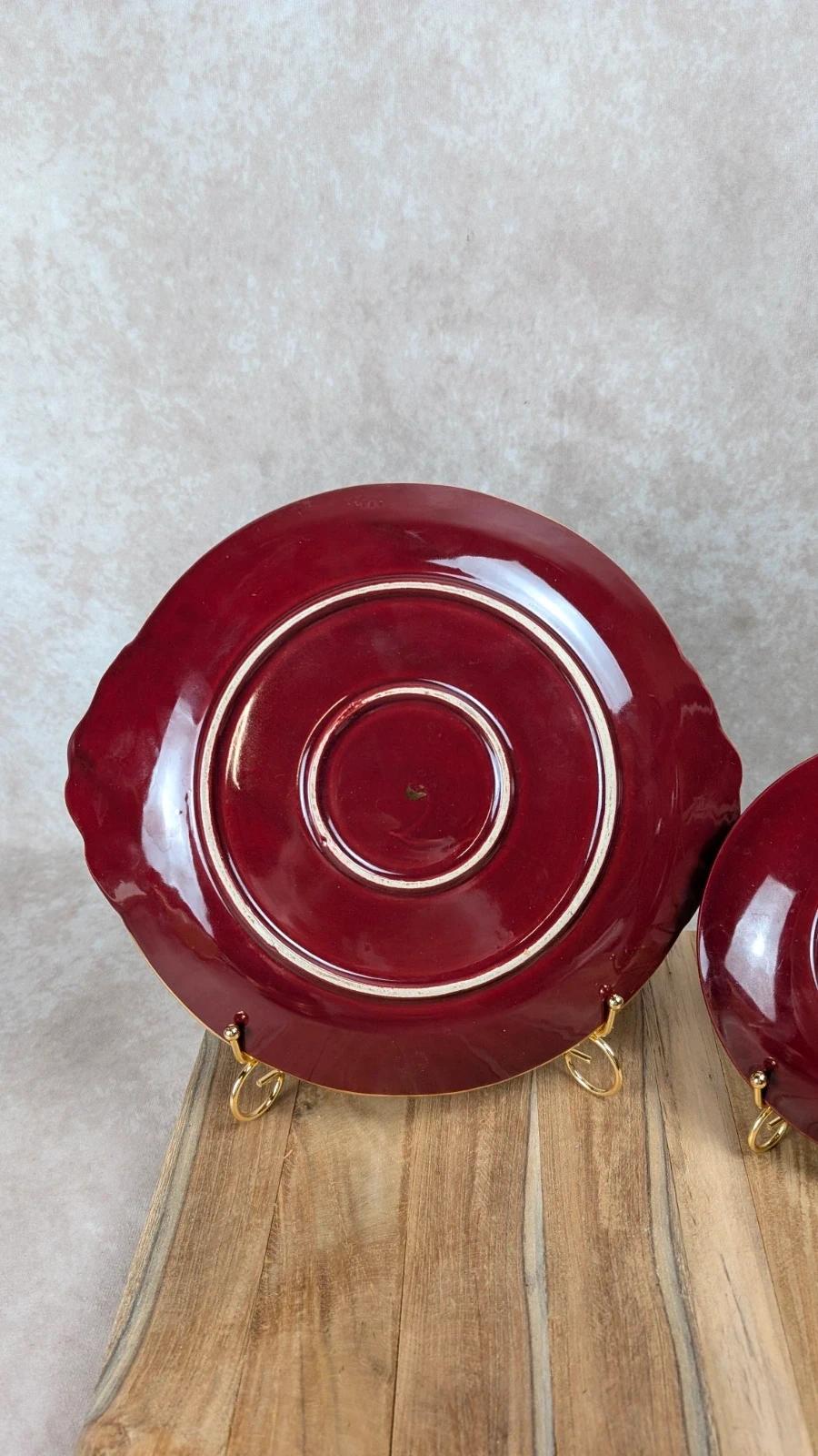 Service à dessert bordeaux et or attribué à Saint - clément