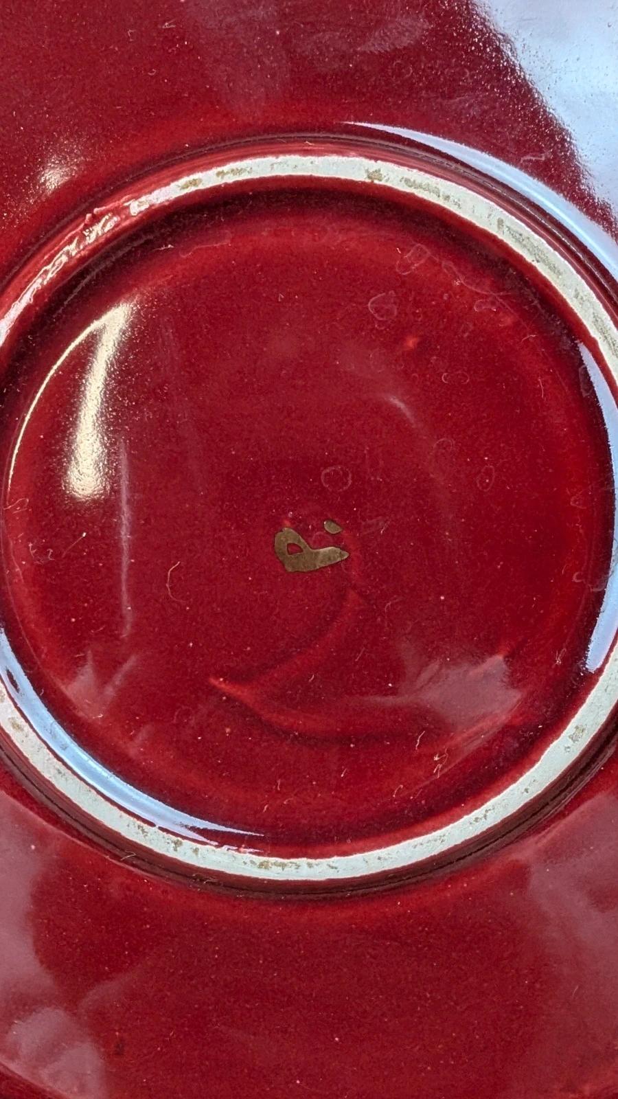 Service à dessert bordeaux et or attribué à Saint - clément