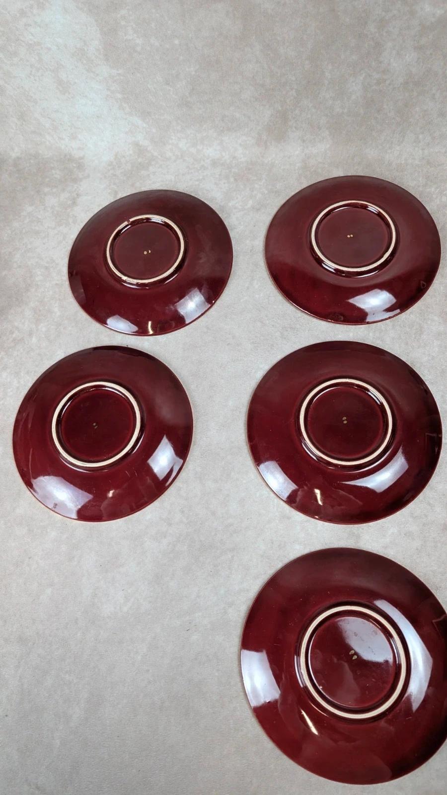 Service à dessert bordeaux et or attribué à Saint - clément