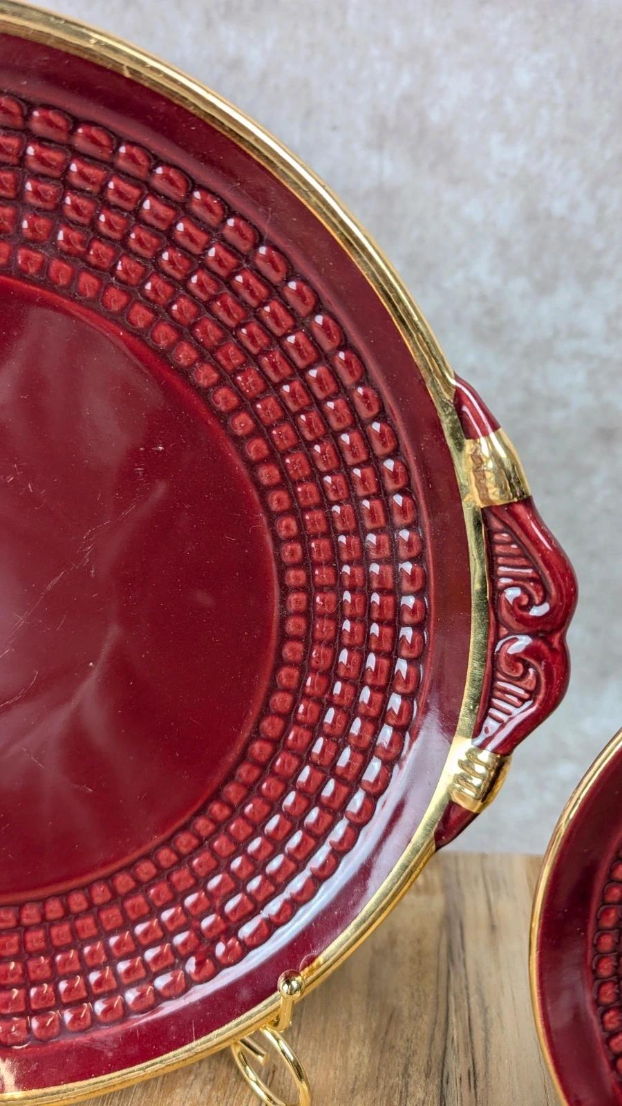 Service à dessert bordeaux et or attribué à Saint - clément