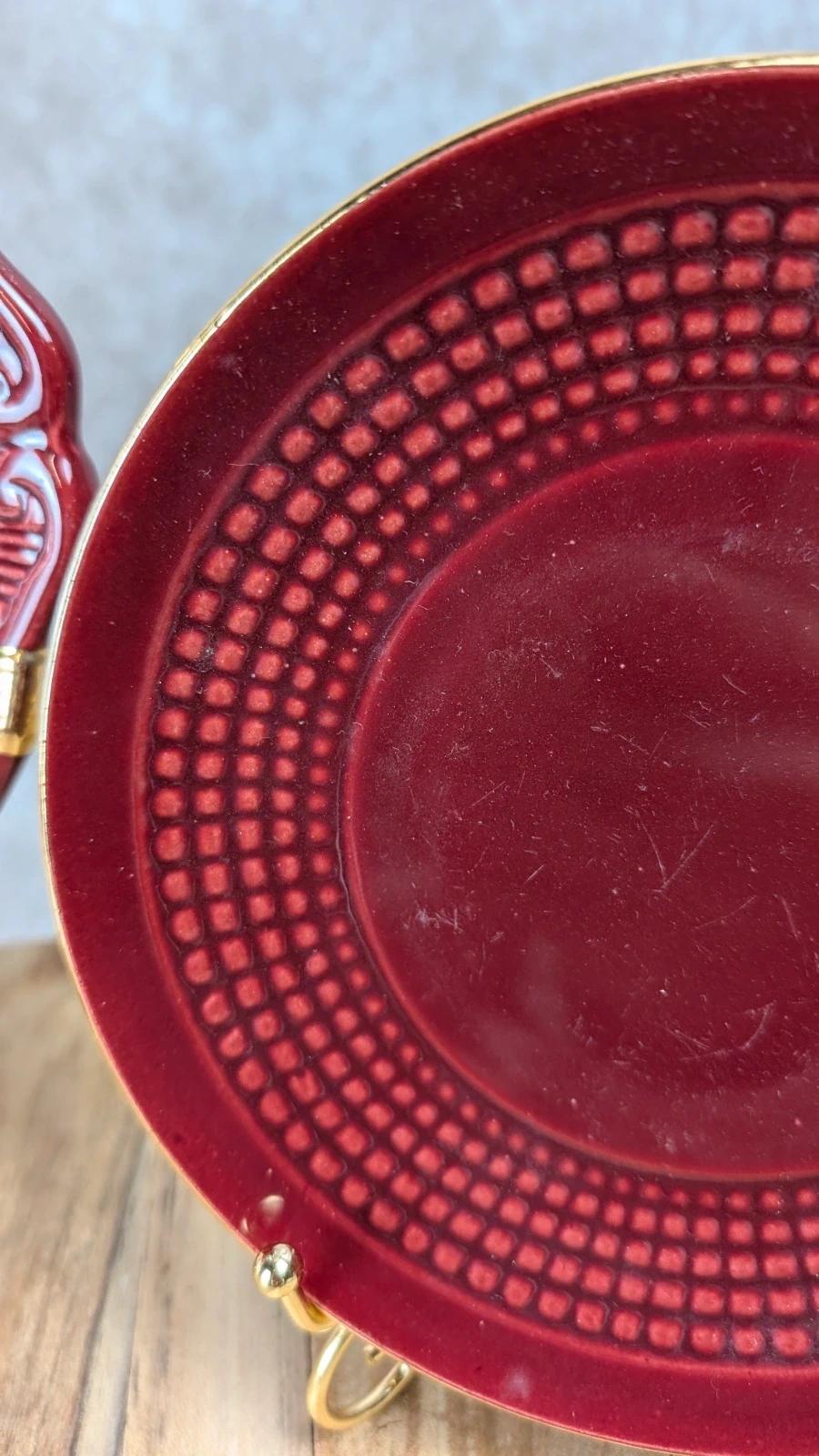 Service à dessert bordeaux et or attribué à Saint - clément