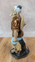 Statuette chinoise ancienne en porcelaine – personnage sage pêcheur