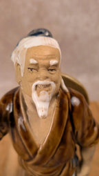 Statuette chinoise ancienne en porcelaine – personnage sage pêcheur