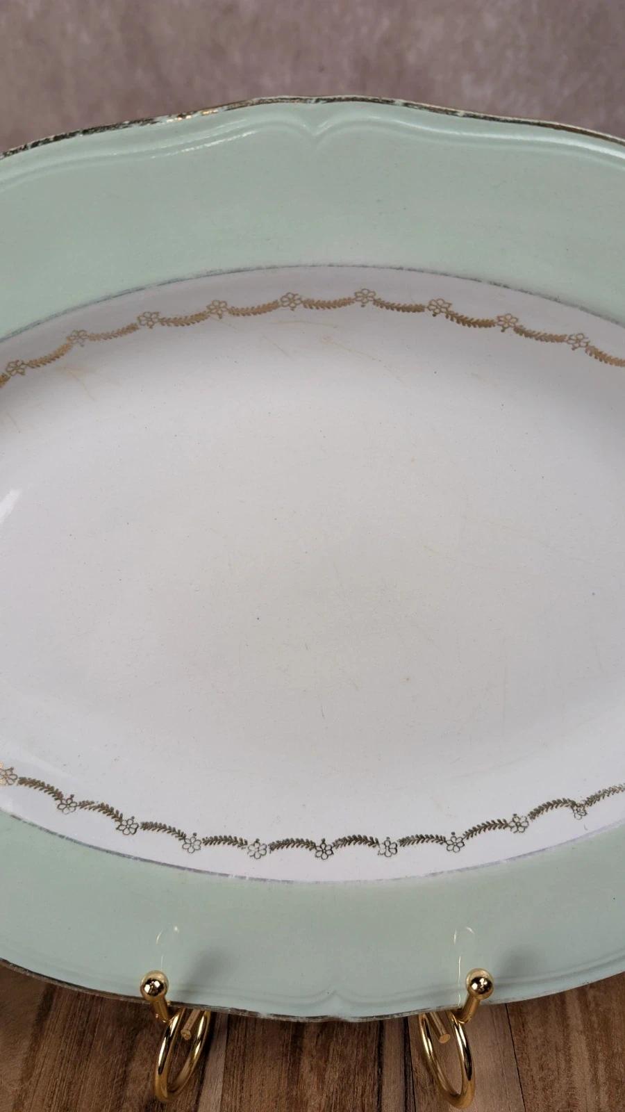 Superbe plat ancien L’amandinoise – modèle Cafés Nico